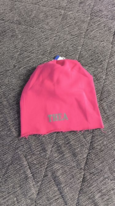 Hovedbilde Lue unisex navn Thea